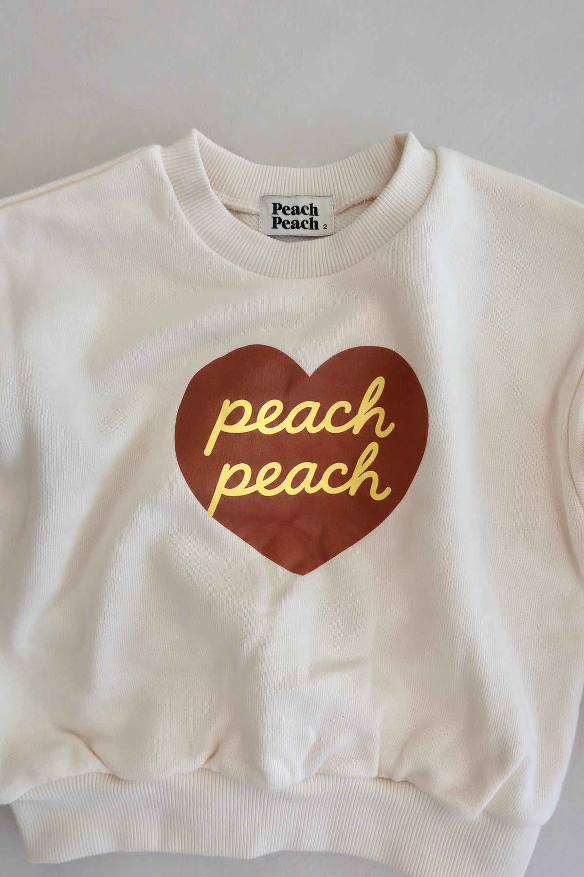 Peach sweater - Ivory